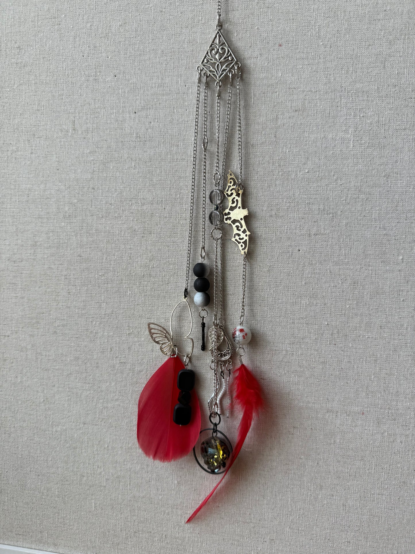 Red Feather Suncatcher