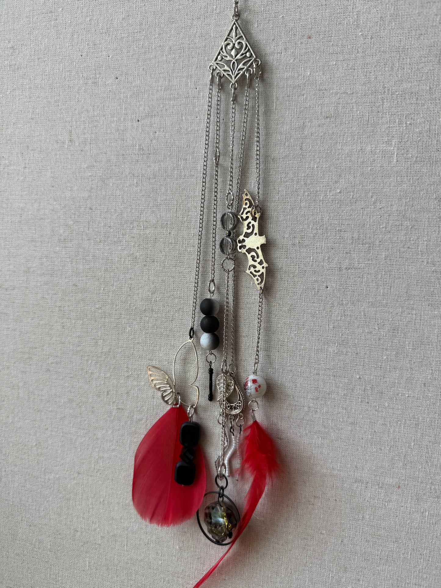 Red Feather Suncatcher