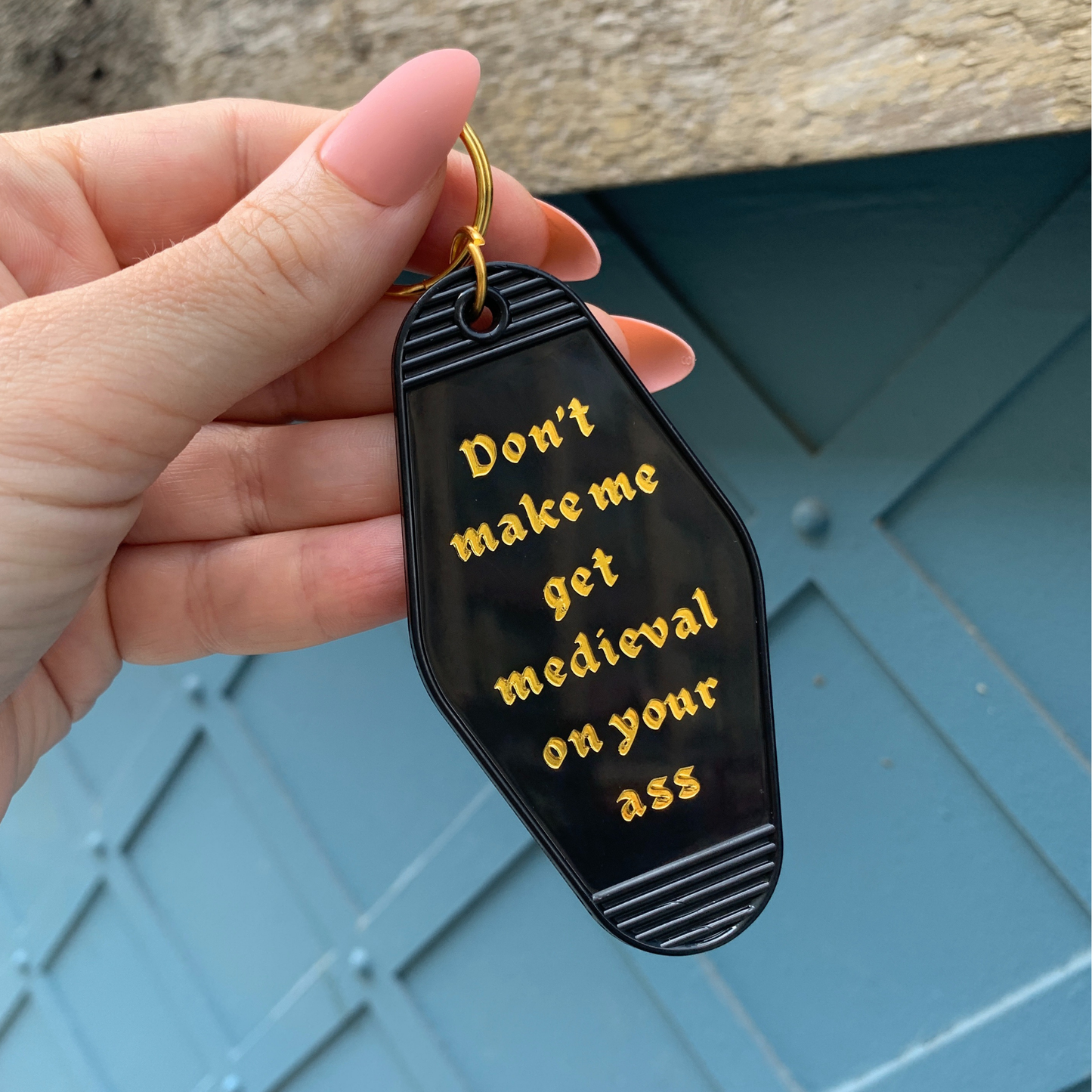Don't Make Me Get Medieval on Your Ass Motel Keychain Black