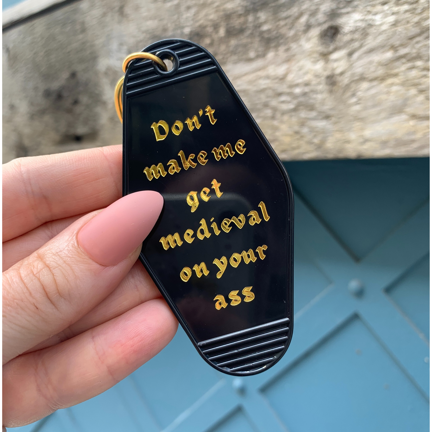 Don't Make Me Get Medieval on Your Ass Motel Keychain Black